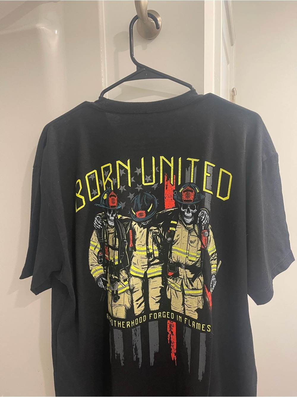 Born United Men’s Black Graphic Tee with Yellow Firefighter Print